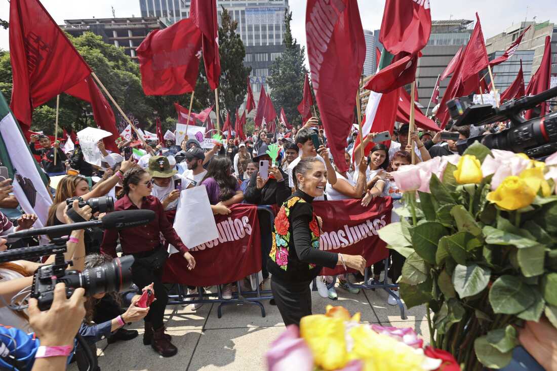 Claudia Sheinbaum greets supporters during the final campaign rally for her presidential candidate to represent the ruling Morena party, in Mexico City, August 26, 2023.