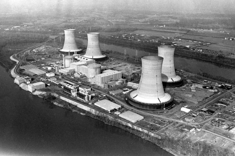 Black and white archival photo of a nuclear power plant.