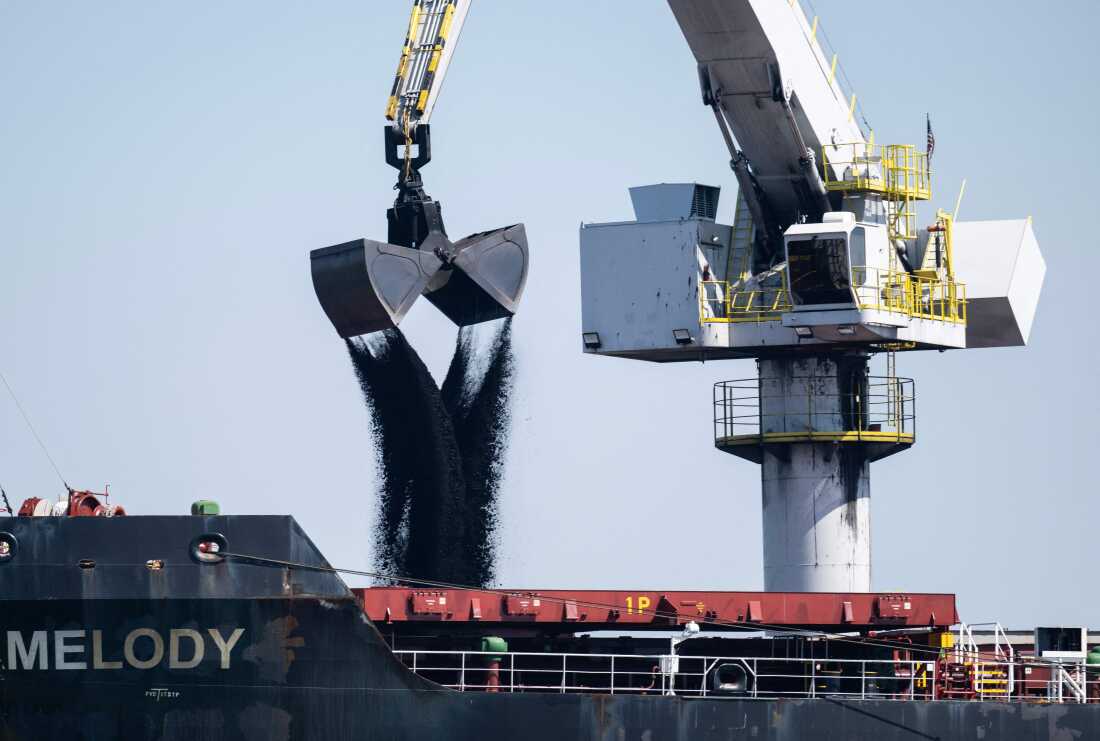 Coal is loaded onto a cargo ship in Louisiana in 2023.