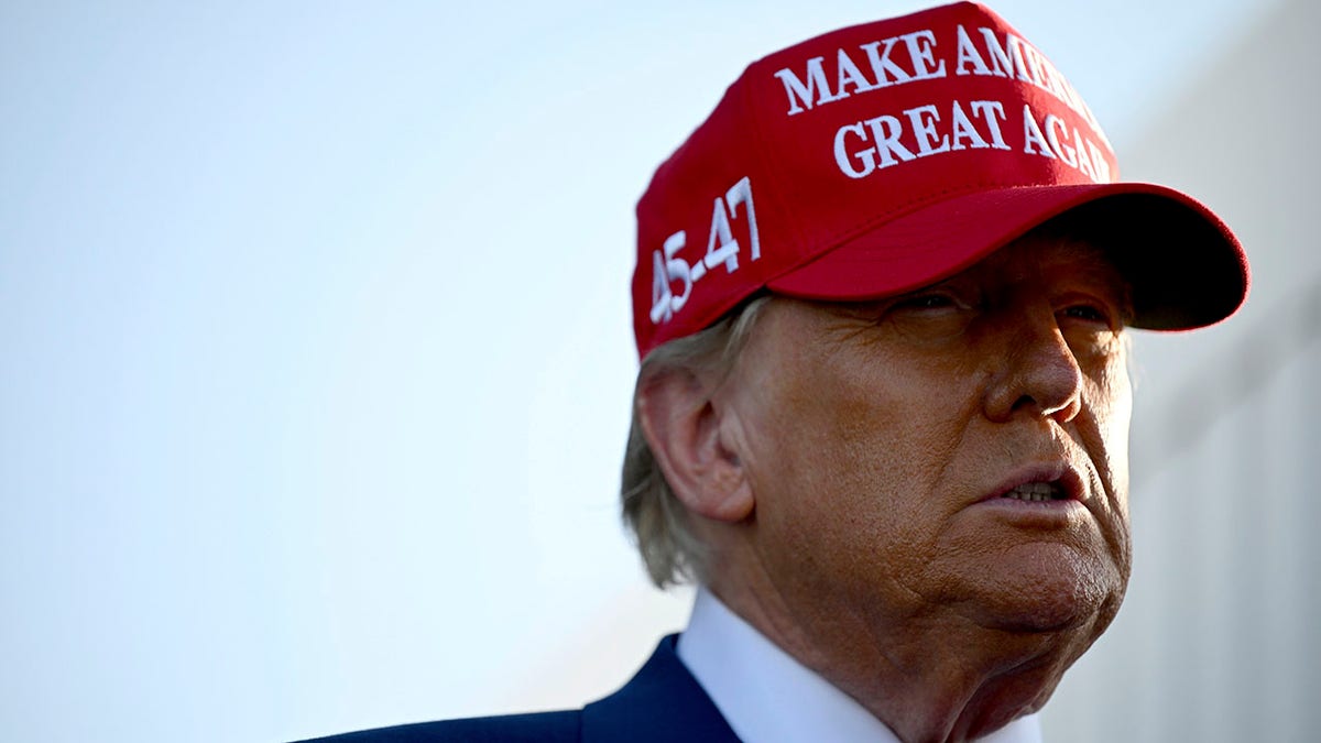 Trump in Texas with a MAGA hat